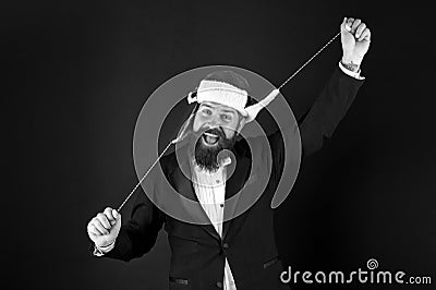 Business and corporate. Man hipster style with beard in smart suit and Santa hat. Businessman Santa in jacket. Christmas Stock Photo