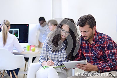 Business couple working together on project at modern startup office Stock Photo