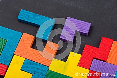 Business creative solution concept jigsaw on the blackboard Stock Photo