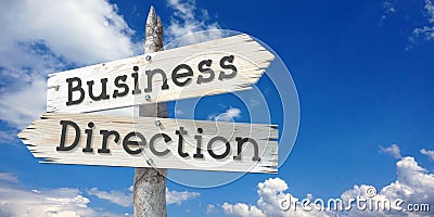 Business direction - wooden signpost with two arrows Stock Photo