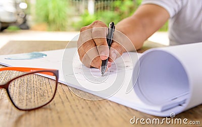 Business,Drawing fiber optic cable on blueprint architectural co Stock Photo