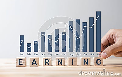 Business earning profit with graph chart.financial growing.investor making money.vision to success Stock Photo