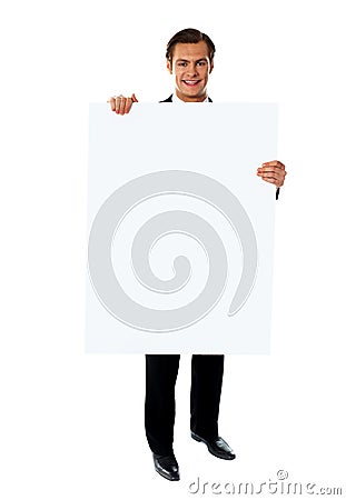 Business executive promoting big blank banner ad Stock Photo