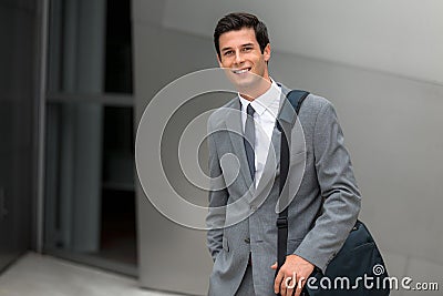 Business executive young adult successful smiling corporate working man handsome portrait Stock Photo