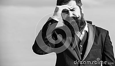 Business failure. Man bearded stressful painful face sky background. Guy suffer headache stressful day. Stressful Stock Photo