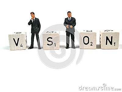 Business figurines forming the word vision Stock Photo