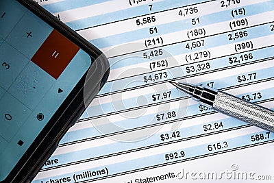 Financial statement and eyeglass, business concept, document is mock-up Stock Photo