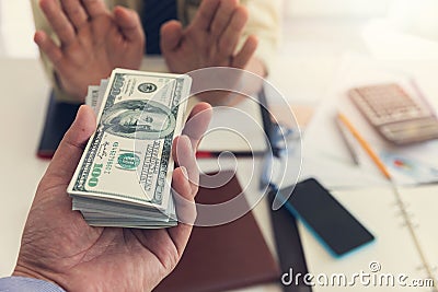 Business and finance concept, Businessman refused money that his partner giving to him Stock Photo