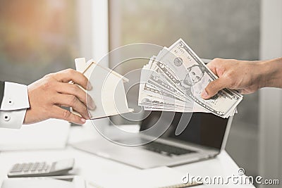 Close Up Hands of male Borrower receive money for renovate house from financial agent Stock Photo