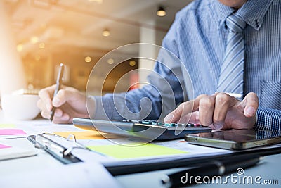 Business finance man calculating budget numbers, Invoices and financial adviser working Stock Photo