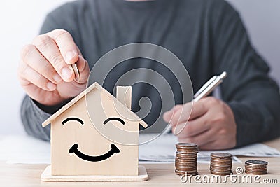 business finance and saving money investment for buying a home, Money coin stack with piggy bank saving concept. Idea for Stock Photo