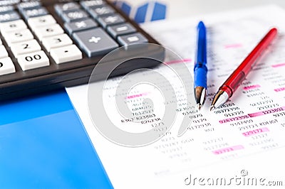 Business and financial background with data, pen and calculator. Bookkeeping background. Stock Photo