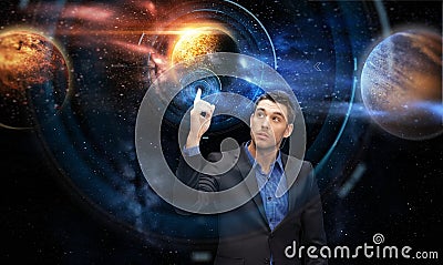 Businessman with virtual planets and space Stock Photo