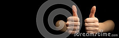 Business gesture. Thumb up close-up. Banner, black background with copy space Stock Photo