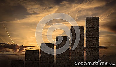 Business Graph Made By Rock Blocks Build with stairs at sunset. Growth and hard work, development and building an empire Stock Photo