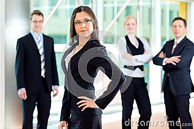 Business - group of businesspeople in office Stock Photo