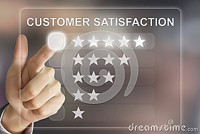 Business hand pushing customer satisfaction on virtual screen Stock Photo