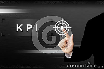 Business hand pushing key performance indicator or KPI button on Stock Photo