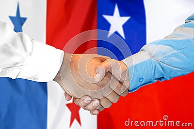 Handshake on Panama and Chile flag background Stock Photo