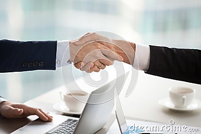 Business handshake concept, male partners businessmen in suits shake hands Stock Photo