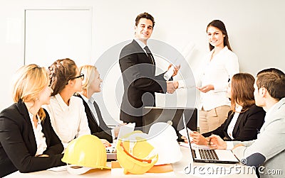 Business handshake in office negotiations with workers Stock Photo