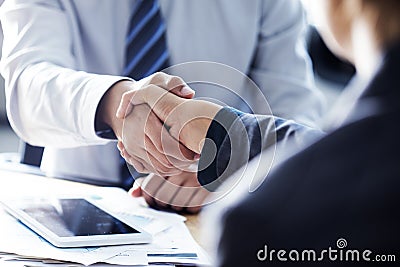 Business handshake in the office Stock Photo