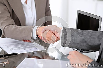 Business handshake. Two women lawyers are shaking hands after meeting or negotiation. Stock Photo