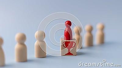 Business hiring and recruitment selection. Career opportunity. Human Resource Management. red human icon standing on a trophy of Stock Photo