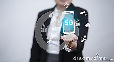 Business hold mobile phone with technology 5G of mobile telecommunication network in Europe for high speed wireless data Stock Photo