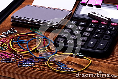 Business idea concept. Notebook, colored elastics and paper clips Stock Photo