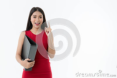 Business and idea concept. Portrait of young Asian beautiful business woman is pointing up and holding file, is finding new job Stock Photo