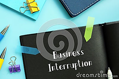 Business Interruption sign on the sheet Stock Photo