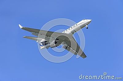 Business jet with landing gear down Editorial Stock Photo