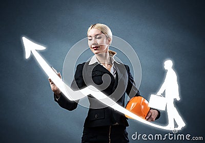 Business lady drawing success graph of career Stock Photo