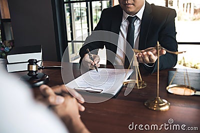 Business lawyer is currently counseling the client`s trial at the lawyer office Stock Photo