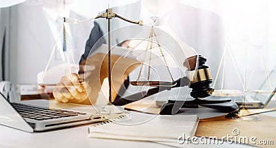 Business and lawyers discussing contract papers with brass scale on desk in office. Law, legal services, advice, justice and law c Stock Photo