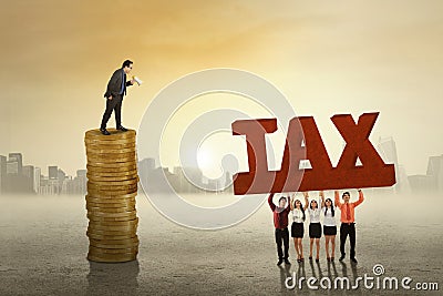 Business leader with employess and tax Stock Photo