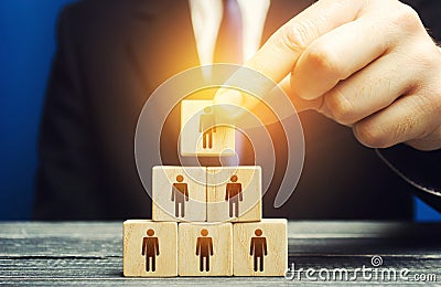 The business leader establishes the structure of the company. Recruiting and appointing employees for suitable posts, creation Stock Photo