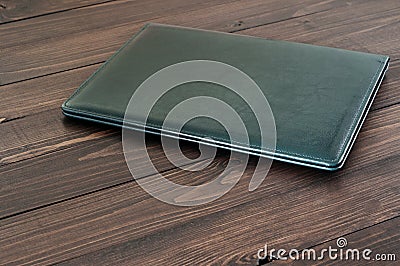 Business leather folder on the office desktop Stock Photo