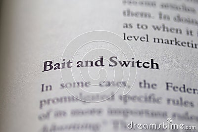 Business legal term bait and switch printed in textbook on white page. Stock Photo