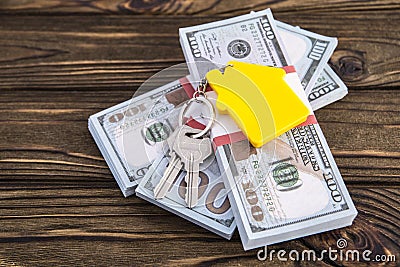 Business loans for real estate concept, keys and yellow symbol house keychain Stock Photo