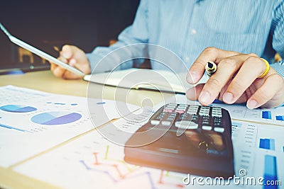 Business man Accounting Calculating Cost Economic concept Stock Photo