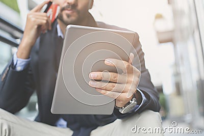 Business man baying over credit card Stock Photo