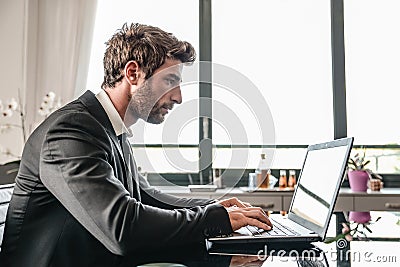 Business man at computer desk Stock Photo