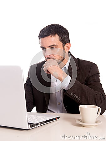 Business man concentrating on a laptop Stock Photo