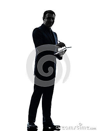 Business man digital pen stylus tablet silhouette Stock Photo