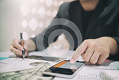 Business man doing finances on calculate analysis working. Stock Photo