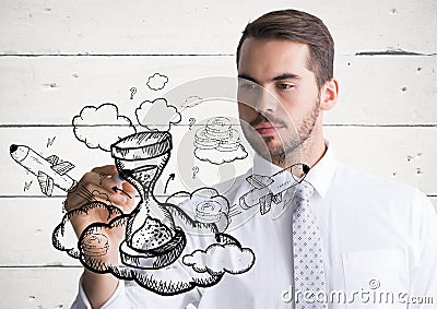 Business man drawing hourglass doodle against white wood panel Stock Photo