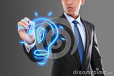 Business man drawing idea light bulb Stock Photo