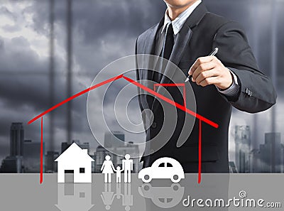 Business man drawing insurance concept Stock Photo